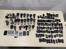 Lot of 85 DEFECT Early OEM Factory keyless entry remotes and Shifter Knobs picture