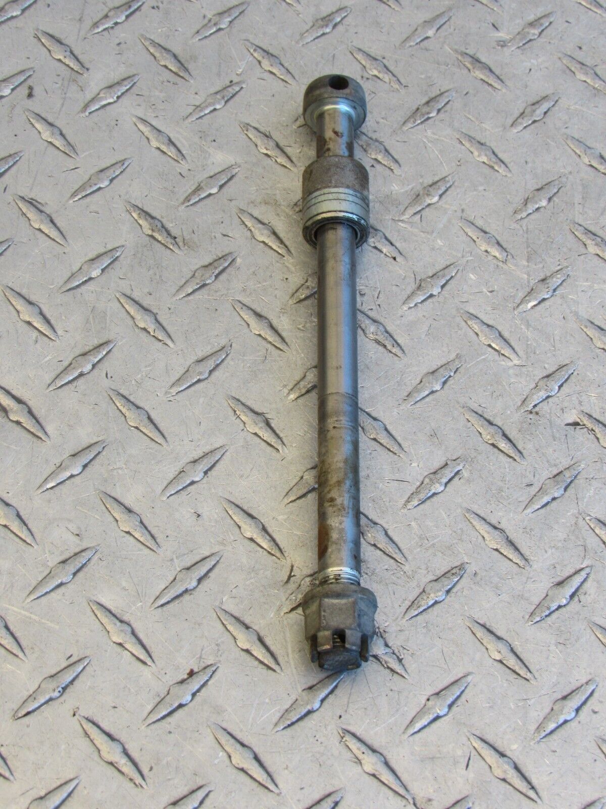 1976 76 HONDA CT90 CT 90 TRAIL FRONT AXLE