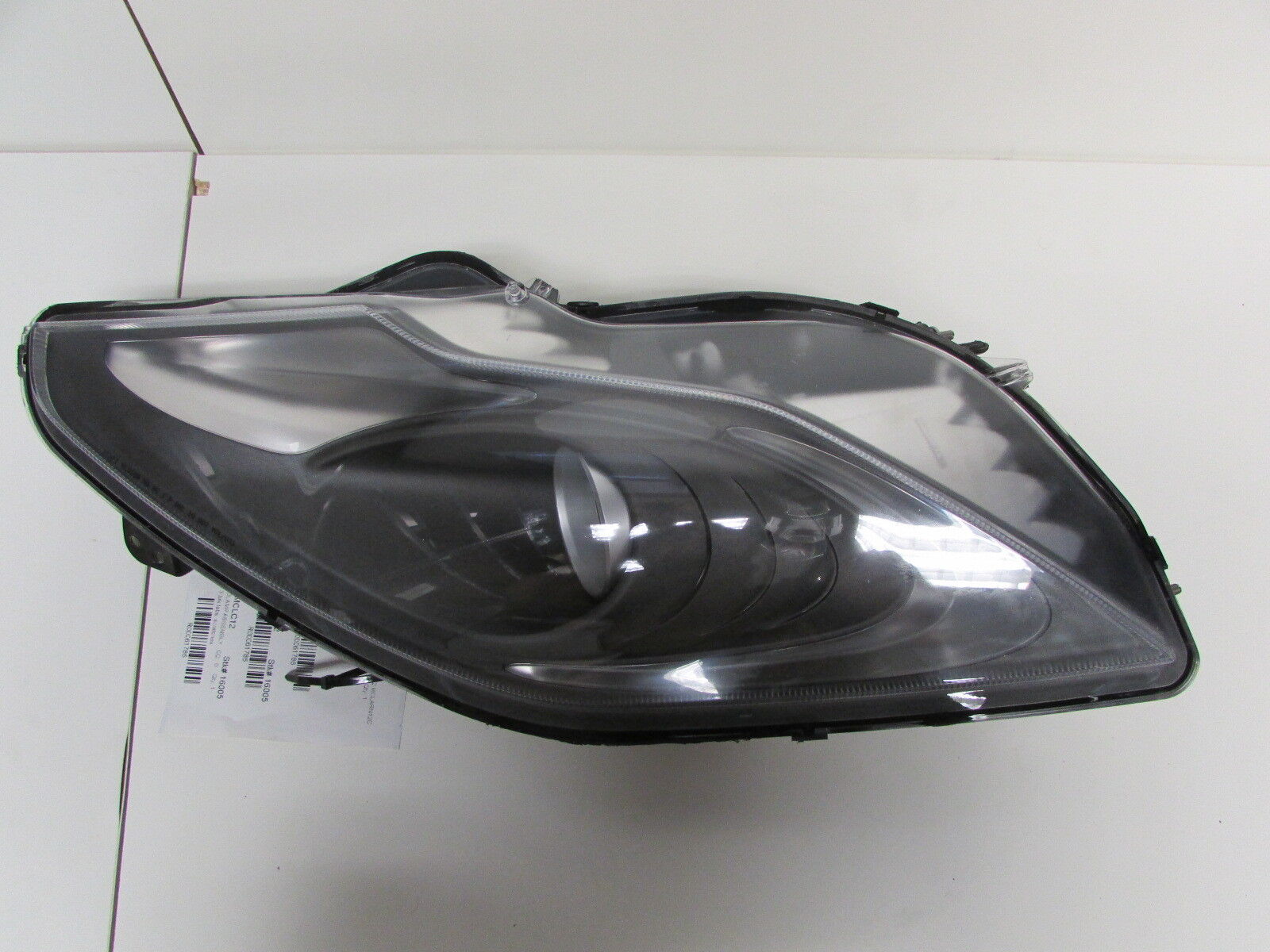 McLaren MP4-12C, Left Headlamp/Headlight Assembly, Used, Broken Tab, Scratches