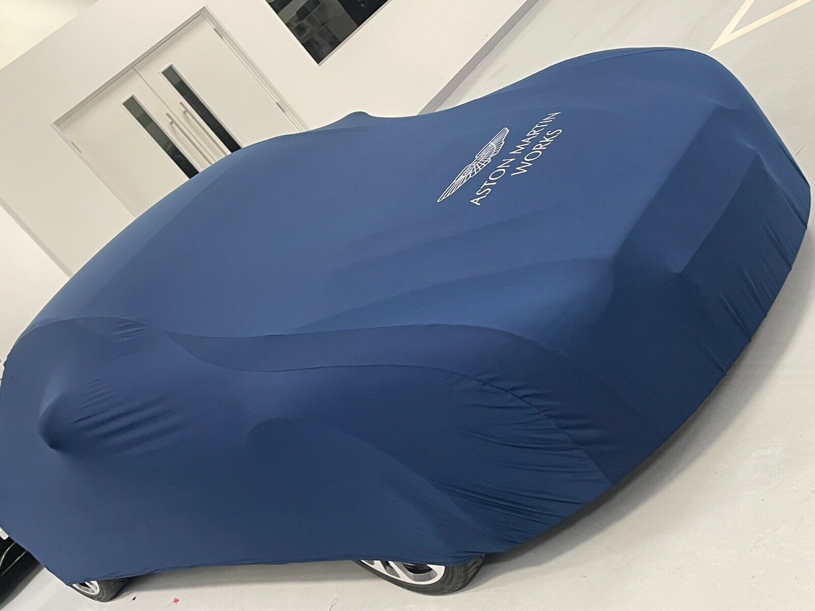 Aston Martin Works Soft Stretch Car Cover in Navy Blue with Silver Wings Logo