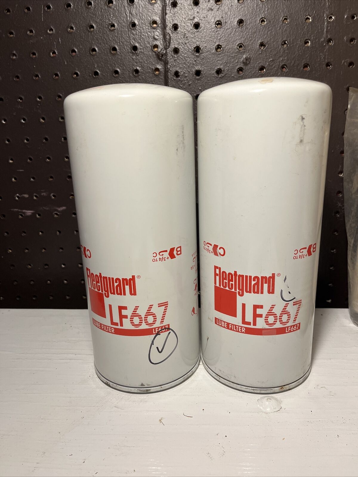 Two Fleetguard Oil Filters, LF 667