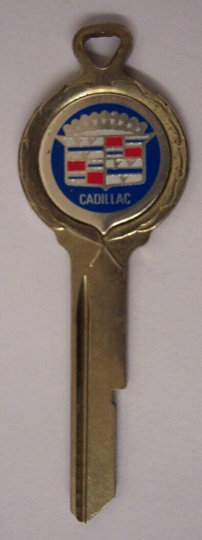 VINTAGE CADILLAC CAR UNCUT KEY BLANK, GOLD PLATED  B50 ON BACK--1960s, 1970s-???