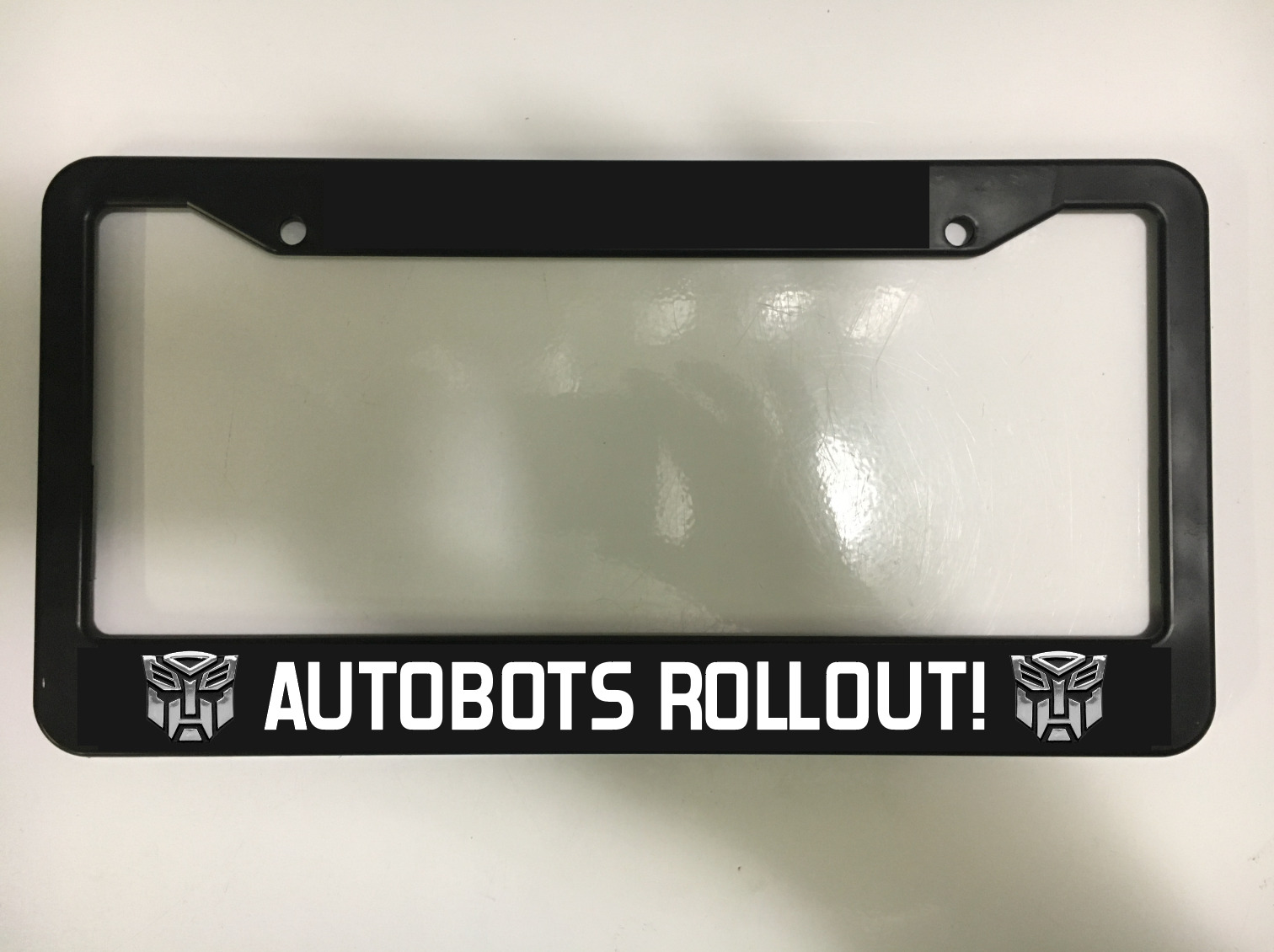 Chrome appearance AutoBots Roll Out Transformers Robot Black License Plate Frame