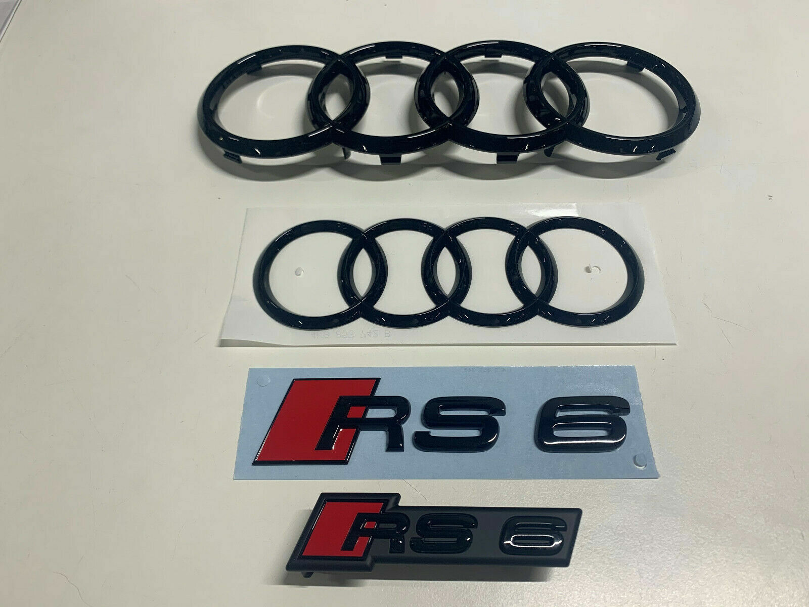 Audi RS6 Audi Rings Front Rear And Emblems Type Designation Black Genuine New