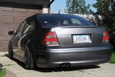 MK4 NEW 99 00 01 02 03 04 05 VOLKSWAGEN JETTA GLI STYLE DUAL REAR LIP KIT picture