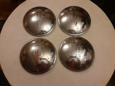 Vintage 1948 Oldsmobile Hubcaps 8 In picture