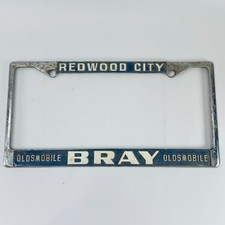 Vintage Redwood City Bray Oldsmobile Dealership License Plate Frame California picture