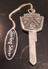 Ford Vintage Key Blank Sterling Silver 1932-1951 with box and sleeve NOS vintage picture