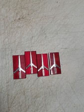 1980'S OLDSMOBILE HUBCAP EMBLEM PLASTIC INSERTS LOT OF 4 NOS GM OEM RED ROCKET picture