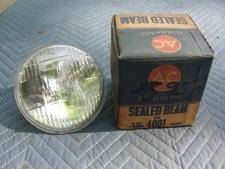 (1) NOS 1960-70's Chevy GM AC GUIDE 4001 T-3 T3 Headlights Head Lights #5956001. picture