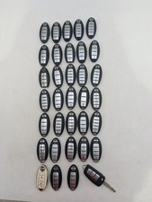 LOT OF 34 OEM NISSAN KEYLESS ENTRY REMOTE KEY FOB LOT  picture