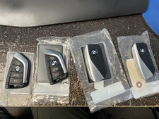 Lot of 4 OEM BMW Smart Key Fobs Genuine Factory Keys – Untested picture
