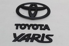 2007 - 2012 TOYOTA YARIS SEDAN EMBLEM LOGO BADGE SET OEM picture