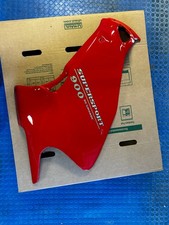 ducati 900ss fairing left ,damaged at directional mounting. picture