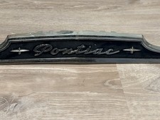 vintage 1951–1953 Pontiac hood grille emblem and trim nameplate picture