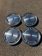Factory 1978 to to 1987 Oldsmobile Cutlass 14 inch hubcaps wheel covers nice picture