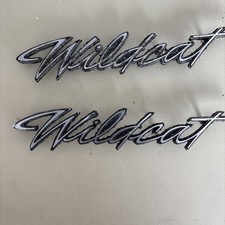 Pair 69 Buick Wildcat OEM Emblems 8727913 picture
