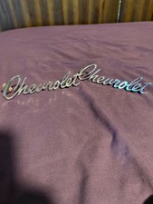 Chevrolet script emblems. I believe they are original from a 1967 Chevy truck. picture