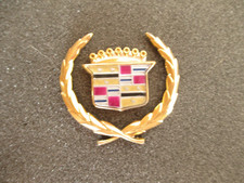 GOLD ROOF WREATH AND 5-COLOR CREST 1985-1993 CADILLAC DEVILLE & FWD FLEETWOOD picture