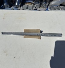 1964 Chevy Impala Dash Glove Box Emblem Moulding USED-ORIGINAL picture
