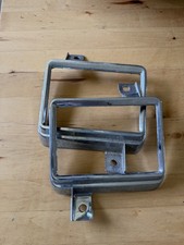 NOS 1974 Olds Cutlass front parking light housings/bezels, left and right, pair picture