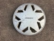 (1) 1984-1986 Nissan 200SX Hubcap, Plastic Wheel Cover, Part# 4031507F00, OEM picture