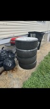 Complete set of Volkswagen R32 wheels, suspension springs, and shocks for sale. picture