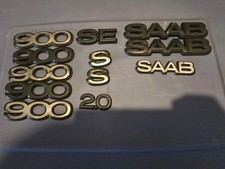 Saab 900 SE OEM rear trunk Fender plastic black Genuine Emblems 12 Total picture