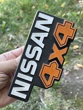 1986/88 Nissan D-21 Hardbody Pickup Truck 4x4 Grille Emblem Badge GEN1 OEM part picture
