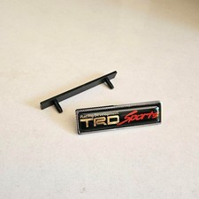 TRD Style Sports Grill Emblem Badge Stainless Steel Resin 6.3x1.8cm Black picture