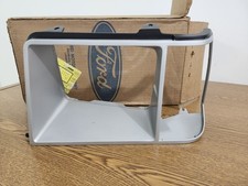 NOS 1981 FORD ESCORT LH HEADLAMP DOOR TRIM BEZEL OEM E1FZ13064h picture