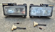 1993-1997 Chevrolet Camaro Driver Side Headlights with bulbs and adjusting picture