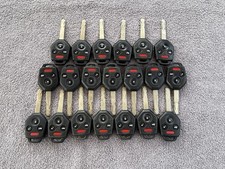 LOT OF 20 USED OEM SUBARU REMOTE HEAD KEY FOB CWTWB1U811 4 BUTTON REMOTE LOT picture