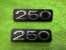 Suzuki  250 OEM NOS sidecover badge picture