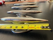 SET OF FOUR VINTAGE - 1960 8-INCH TORPEDO CLEATS picture