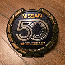 Vintage Nissan 50th Anniversary Badge. New Never Used picture