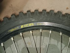2004 Kawasaki 04-07 KX250F EXCEL FRONT WHEEL RIM HUB SPOKES TIRE GOOD picture