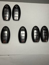 Lot of 6 OEM Nissan Smart Keys Mixed FCC Used Locked picture