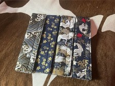four Japanese-inspired style fabric patterned seatbelt covers picture