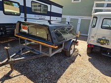 A.R.E. pickup topper for late model 2500 GM truck. Dark Blue, Shell Camper picture