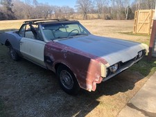 1967 Oldsmobile Cutlass 442 Convertible PARTS (Headlight Bezels/Wire Hub Caps) picture