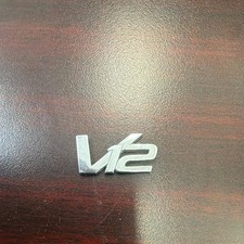 Used OEM Aston Martin V12 Side/Trunk Badge / AD23-43548-DA picture