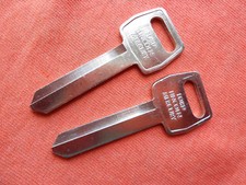 2 Ford ORIGINAL OEM KEY BLANKS 1985 - 1996 picture
