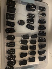 A Lot Of 35 Gm And Maserati Remotes/Smart Keys Used Most In Working Condition picture