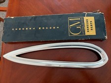 1959 Chevy tail lite bezel in GM box dented NOS Driver Side picture