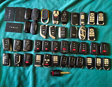 Lot Of 43-Piece OEM Car Key Fob Lot – Tesla, Rivian, Toyota, BMW, Lexus, Acura picture