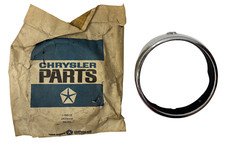 New Old Stock Left Headlight Bezel for 1966 Plymouth Valiant Models #2578009 picture