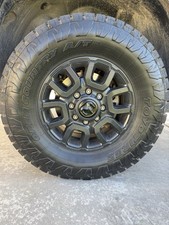 35x12.5R18 Toyo Tires With Ram 18in OEM Rim picture