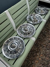 NEW NORS 1957 Cadillac Eldorado hubcaps Set center bullets OLD REPRODUCTION picture