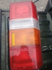 84-89 Toyota Van OEM Left Combination Tail Light Assembly, passenger, black picture